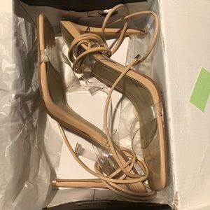 Strappy nude/clear pumps